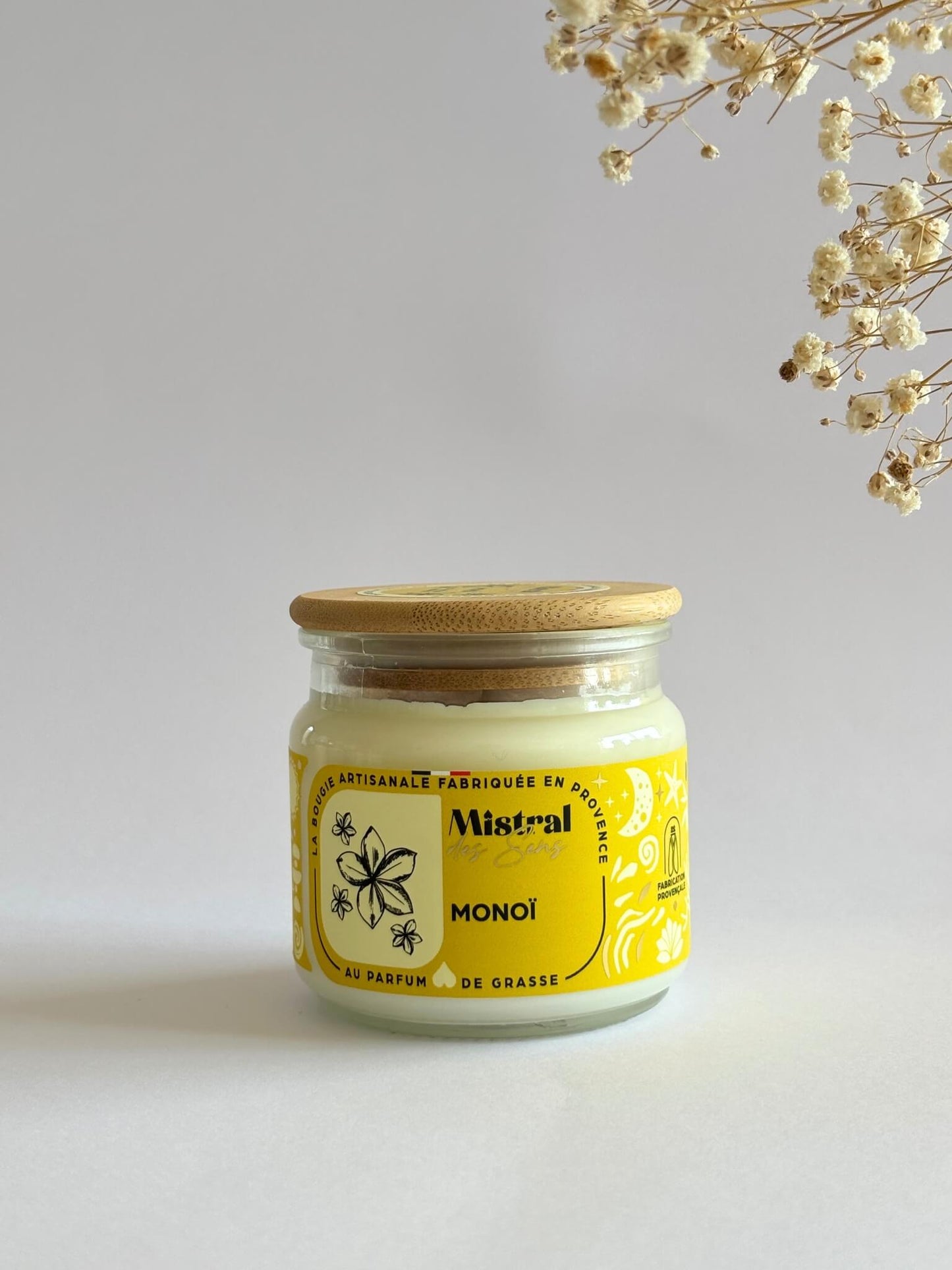 Bougie parfumée au monoï, senteur florale, fabriquée en Provence.
