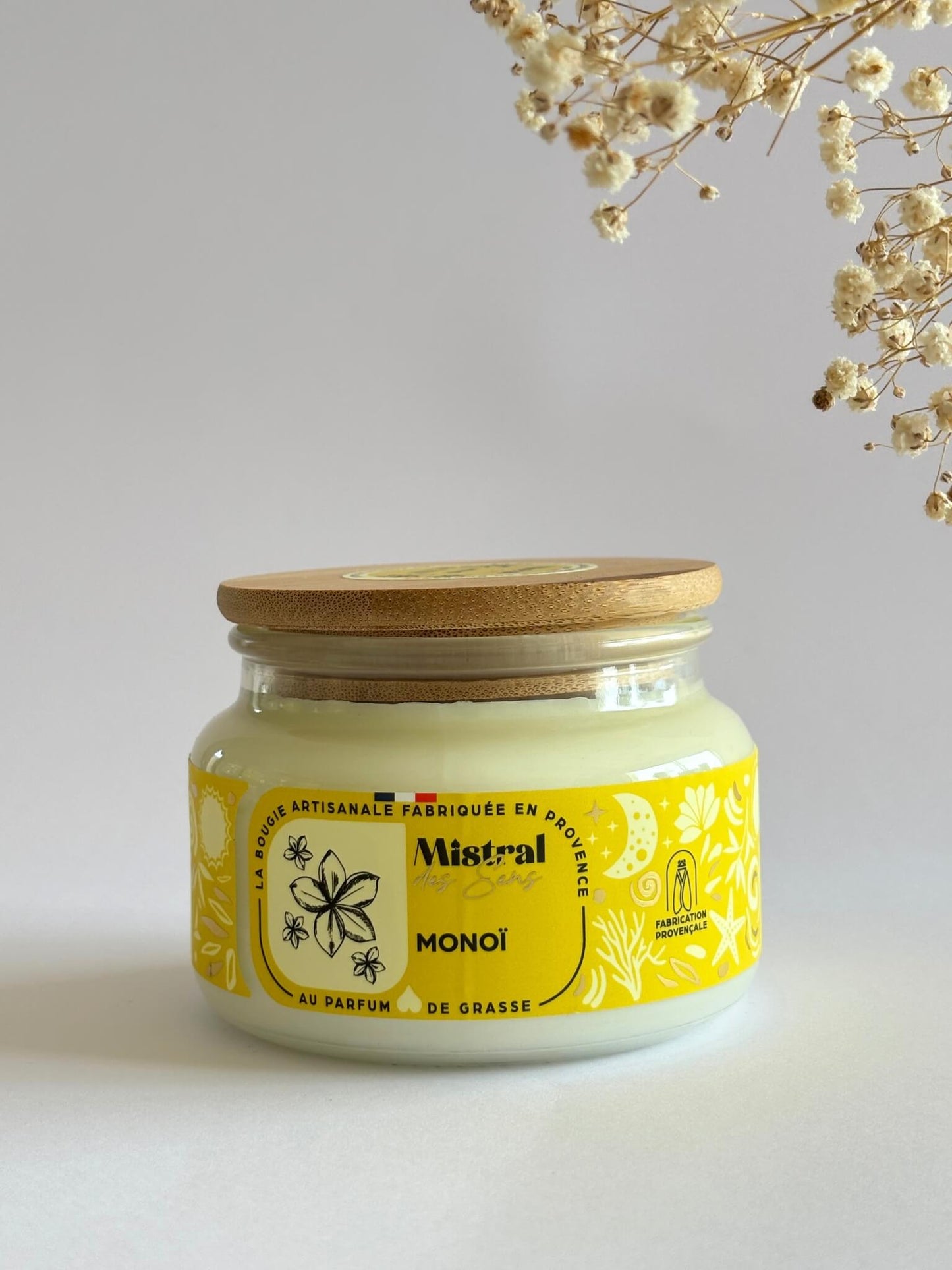 Bougie parfumée au monoï, senteur florale, fabriquée en Provence.