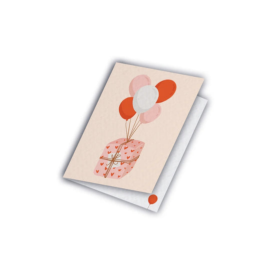 Carte d'anniversaire avec un cadeau et des ballons, Maison Joliette.