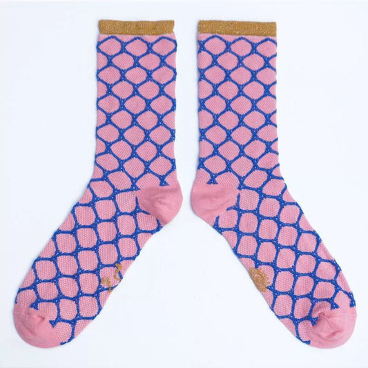Chaussettes roses et bleues à paillettes pour femme, solidaires et fabriquées en France.