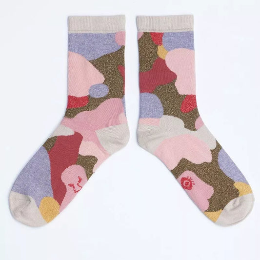Chaussettes multicolores à paillettes pour femme, solidaires et fabriquées en France.