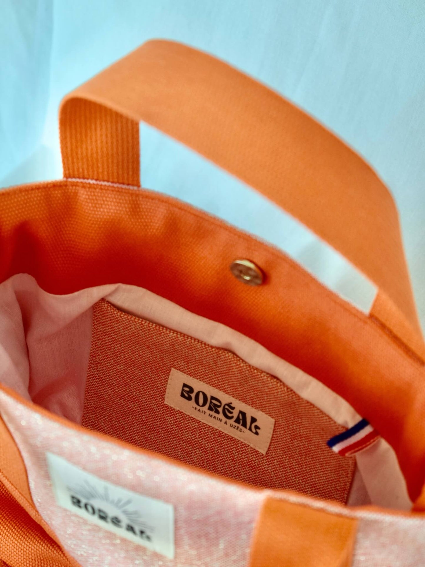 Sac à bandoulière en coton orange avec des paillettes, Boréal.