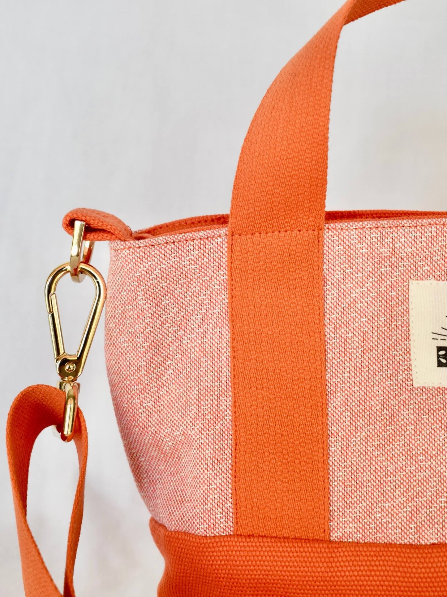 Sac à bandoulière en coton orange avec des paillettes, Boréal.