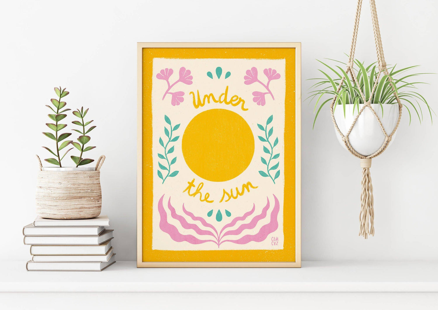 Affiche murale colorée avec des fleurs, un soleil, et un message positif, dans un cadre blanc.