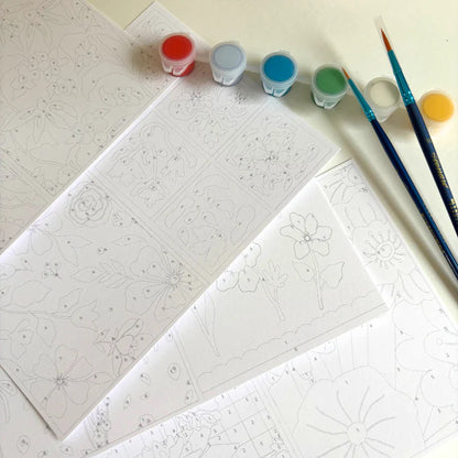 Kit peinture aux numéros avec huit illustrations, deux pinceaux et des pots de peinture, salut irène.