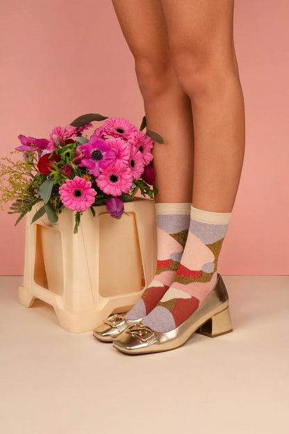 Chaussettes multicolores à paillettes pour femme, solidaires et fabriquées en France.